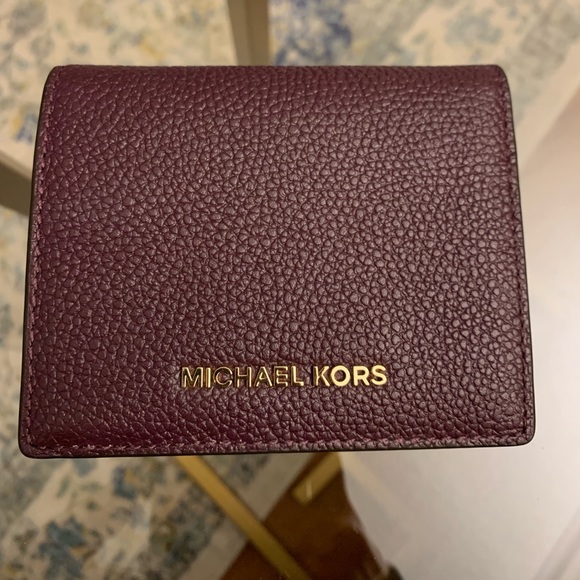 Michael Kors Handbags - Michael Kors Berry Color Wallet